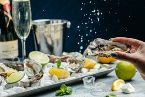 Oysters,With,Wine,,Lemon,,And,Ice.,Oysters,Dish.,Oyster,Dinner